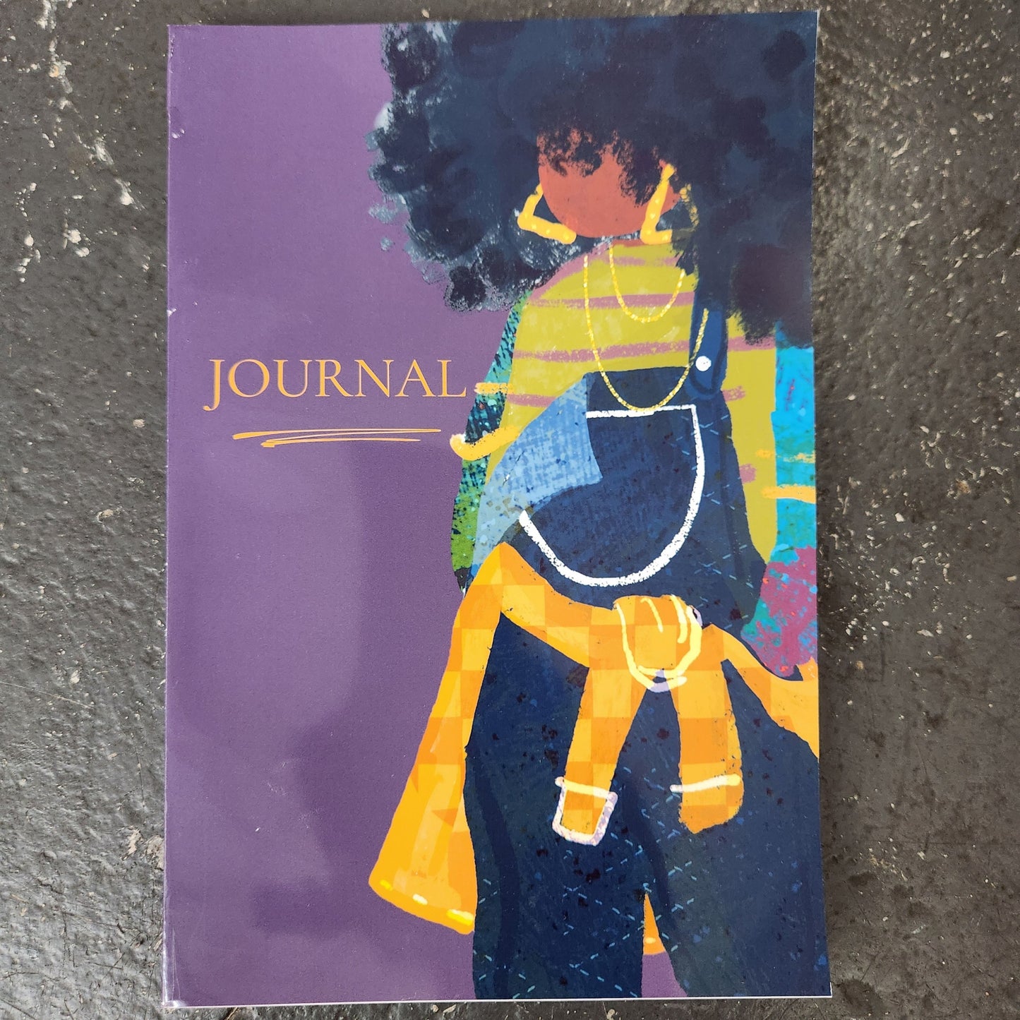 JJ handmade journal with purple cover and colorful character artwork