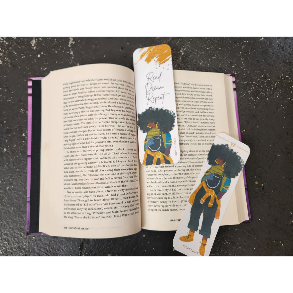JJ handmade bookmark set shown in use with an open book
