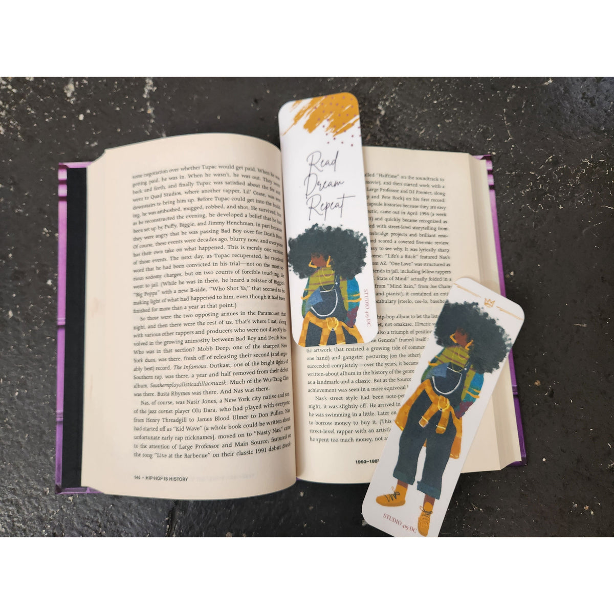 JJ handmade bookmark set shown in use with an open book