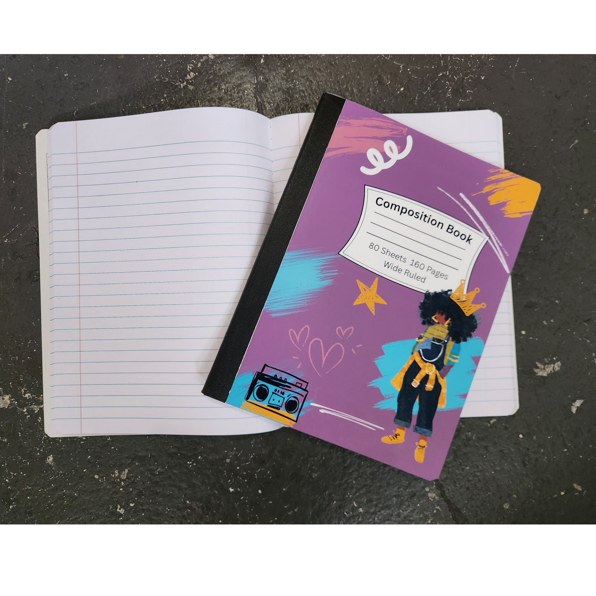 JJ ruled composition book shown open to writing pages